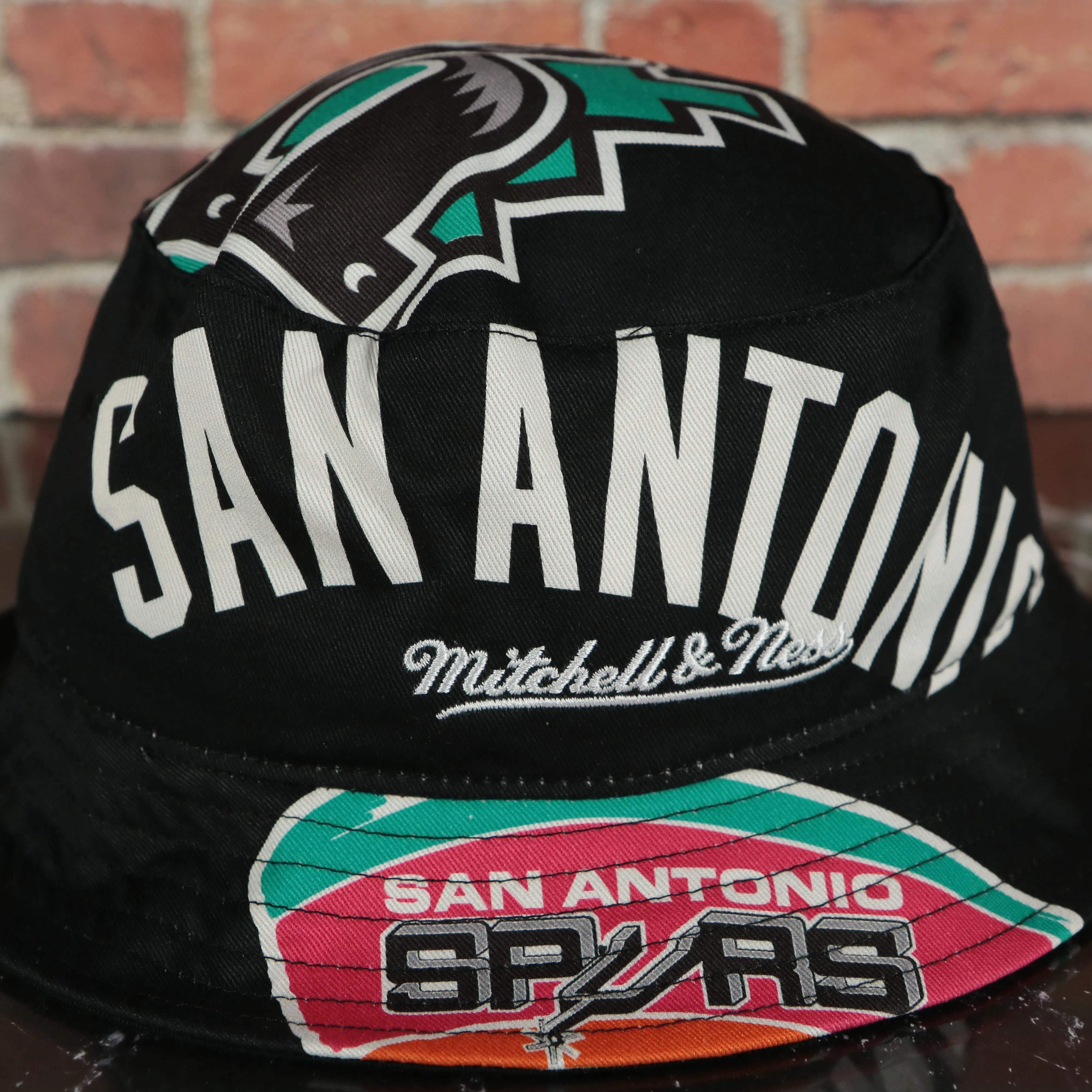 San Antonio Spurs All Over Vintage Logo Cut Up Bucket Hat | Black