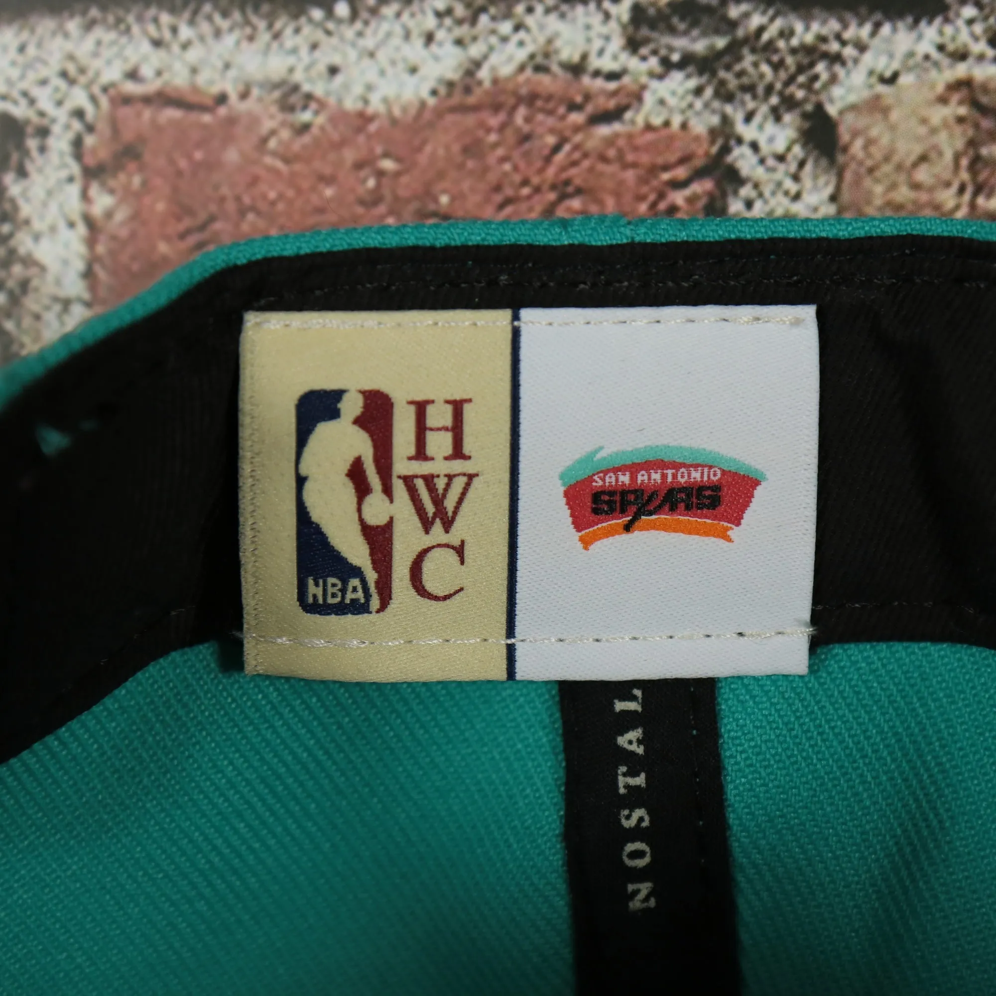 San Antonio Spurs Hardwood Classics Jumbotron Spurs Ripped Logo side patch Grey Bottom Teal/Red Snapback hat | Mitchell and Ness